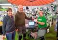 £500 cash donation from Thurso hardware shop to cancer charity