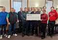 Air ambulance charity cheque handed over after Nethercliffe whisky-tasting