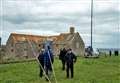 Amateur radio enthusiasts mill about at John O'Groats 