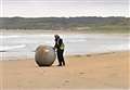 A scene from a classic 60s TV series or just a man and buoy at Dunnet beach? 