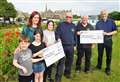 A grand evening for a grand's worth of charity cheques from Caithness Model Club 