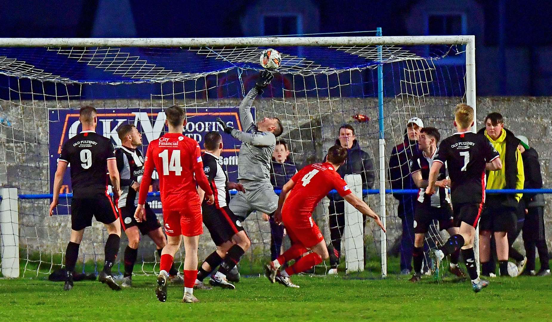 Colin Williamson's header flies past Wick keeper Graeme Williamson for the only goal in the midweek clash at Golspie. Picture: Mel Roger