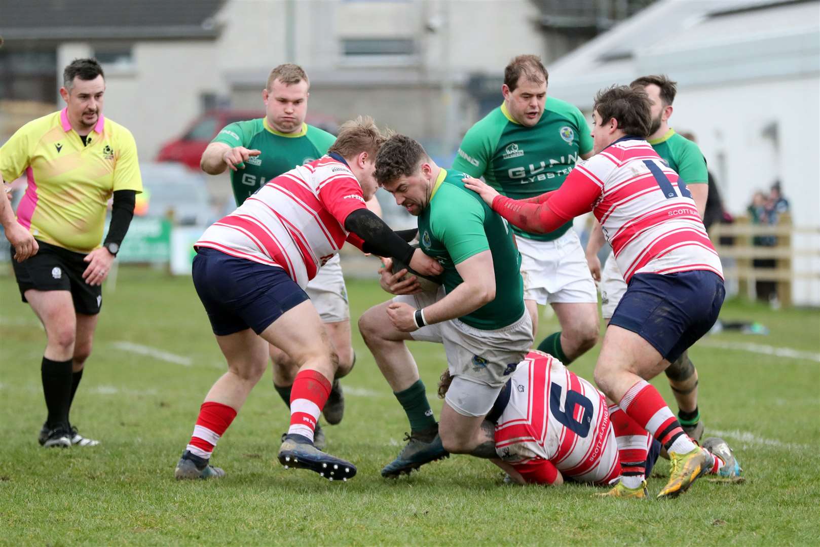 It takes three opponents to stop Calum MacDonald during the Greens' 33-31 defeat to Moray earlier this month. Picture: James Gunn