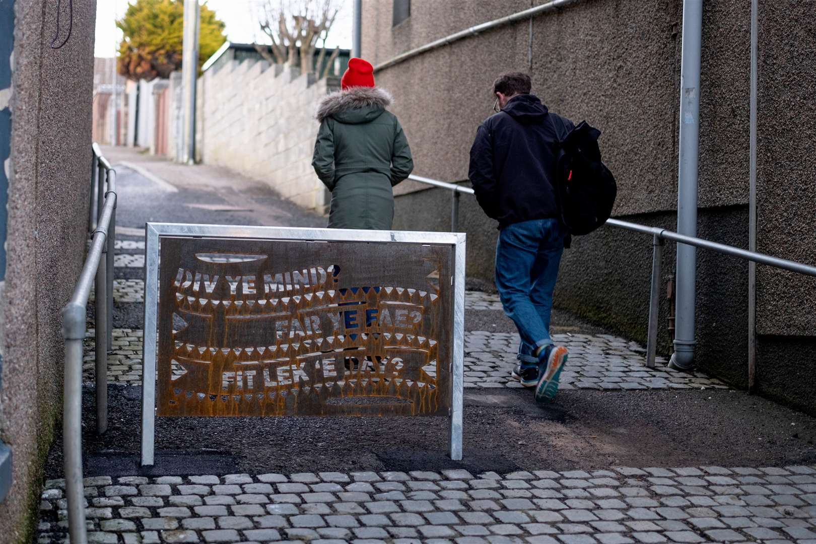 A decorative metal barrier featuring phrases in Caithness dialect has been installed at John Street. Picture: Sustrans