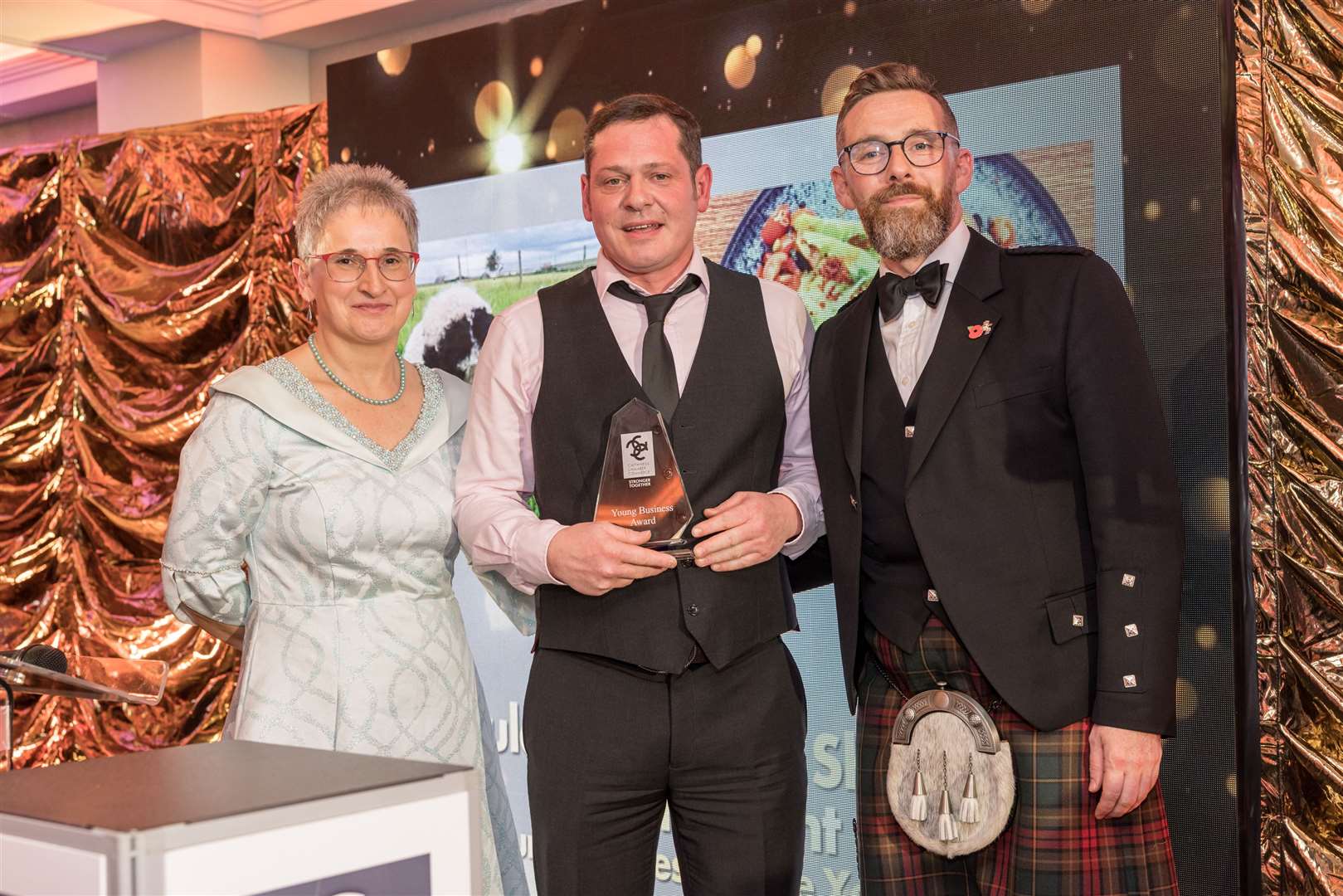 From left, Trudy Morris, CEO Caithness Chamber of Commerce, Greg Hooker owner of Puldagon Farm and Restaurant and David Armour of Pentland Floating Offshore Wind, sponsors of the Young Business Award. Picture: Studiograff Photo