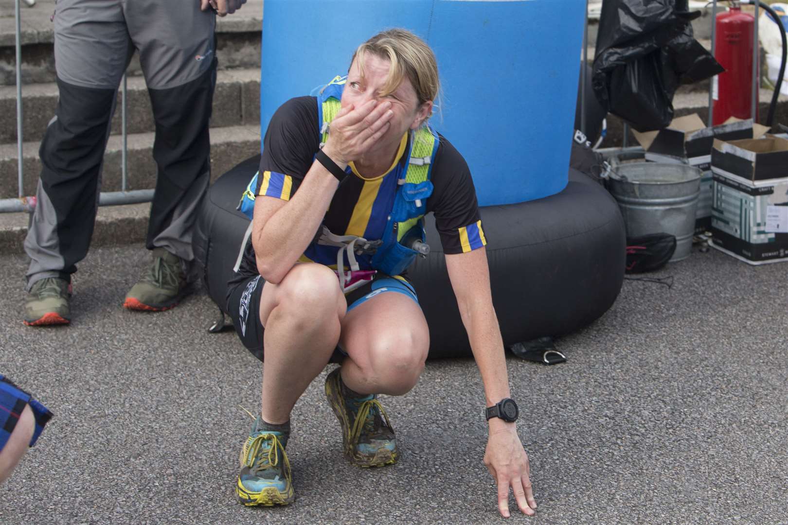A look of absolute shock as Debbie Larnach realises that Steven Munro, her partner of six years, has just proposed to her on the finishing line of the Celtman Extreme Scottish Triathlon, in Wester Ross. Photo: Robert MacDonald