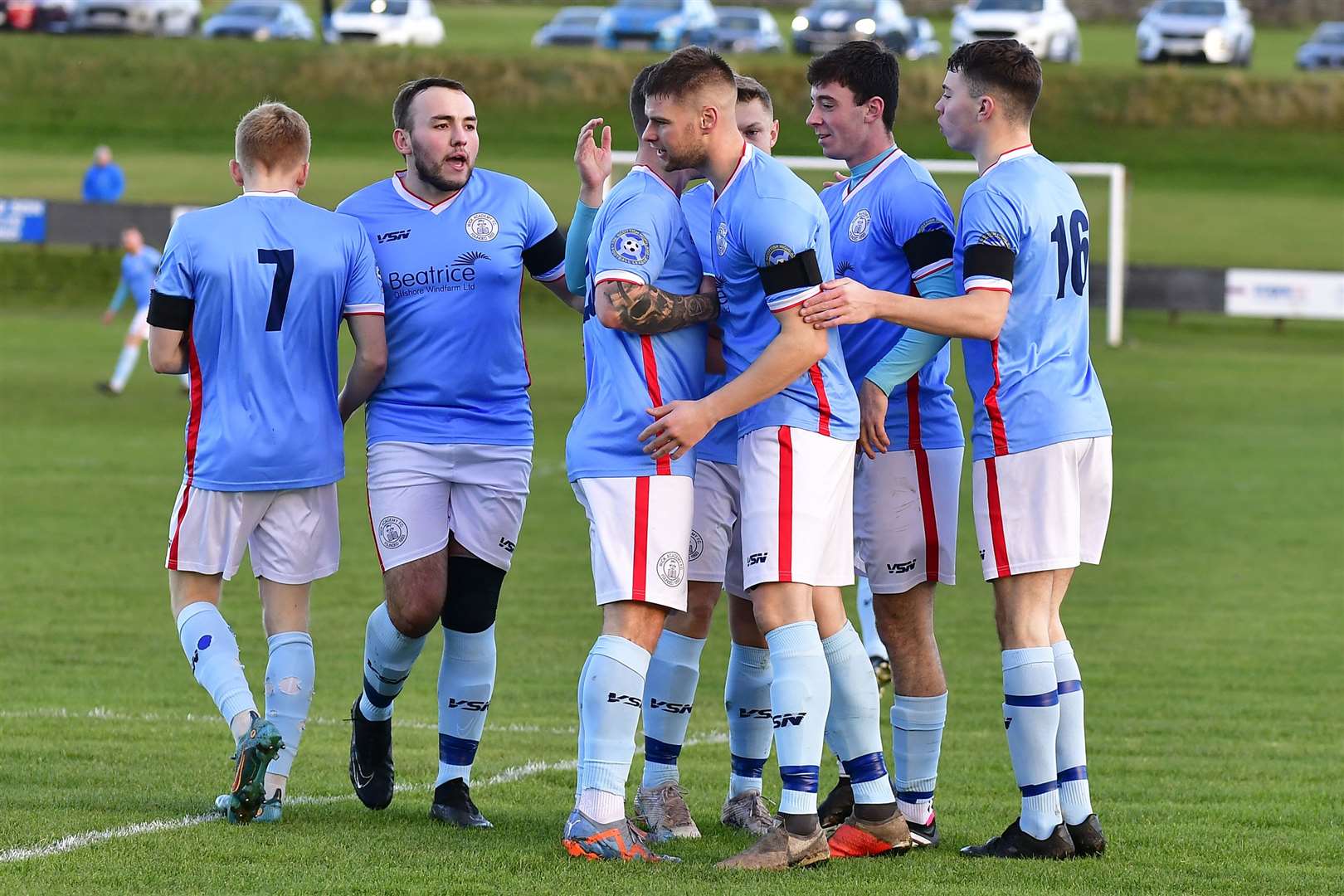 Wick Academy players celebrate after Kyle Henderson (second from right) cancelled out Huntly's early opener. Picture: Mel Roger