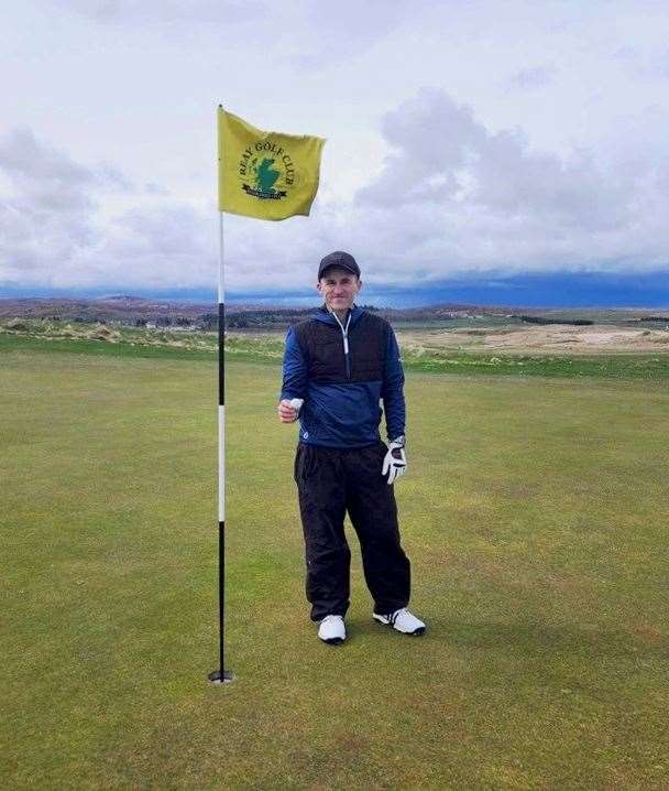 Wick’s Nicky Klimas celebrates his hole in one at the 15th at Reay.