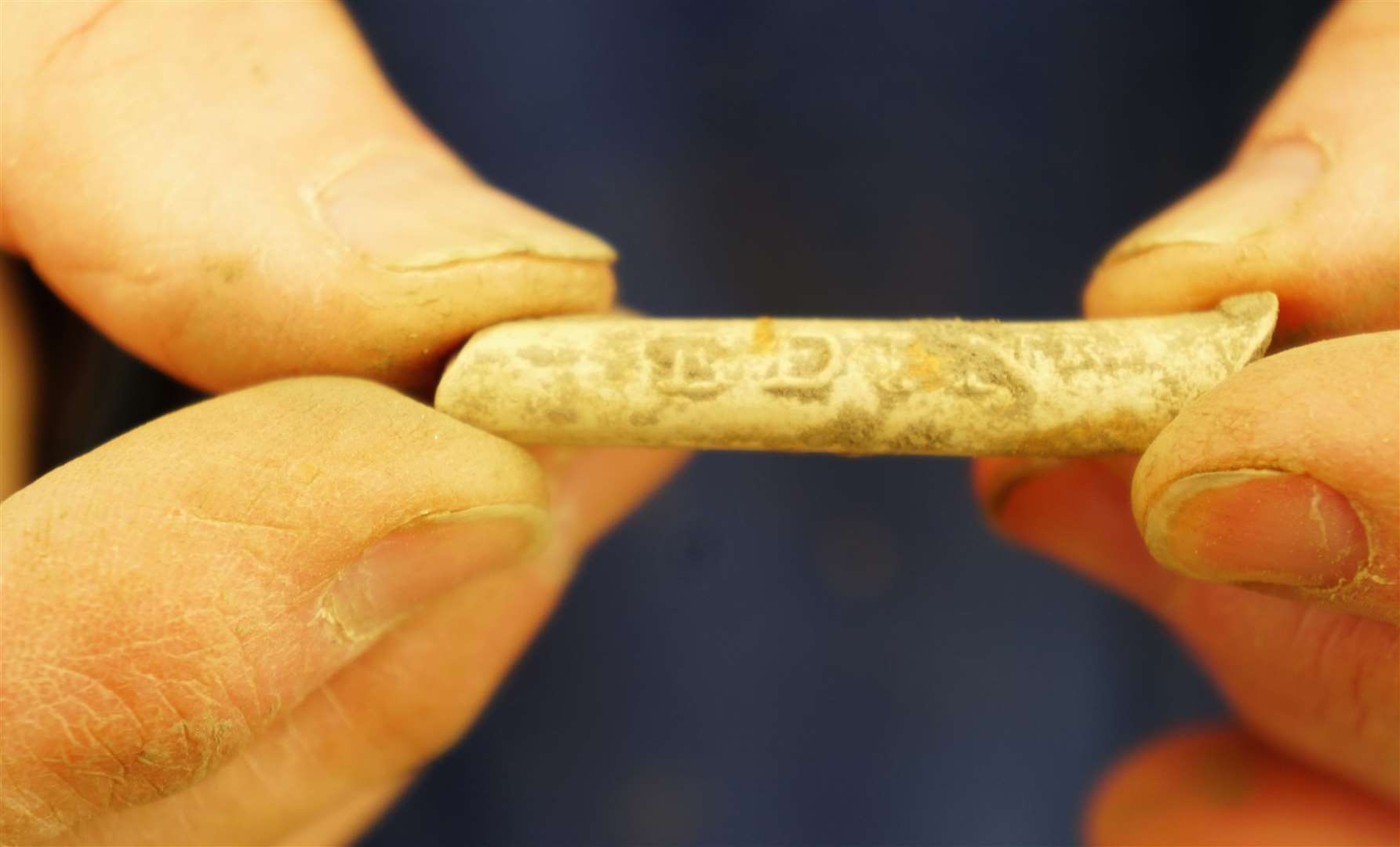 Piece of a clay pipe which shows lettering 'EDIN' which probably means it was manufactured in Edinburgh. Picture: DGS