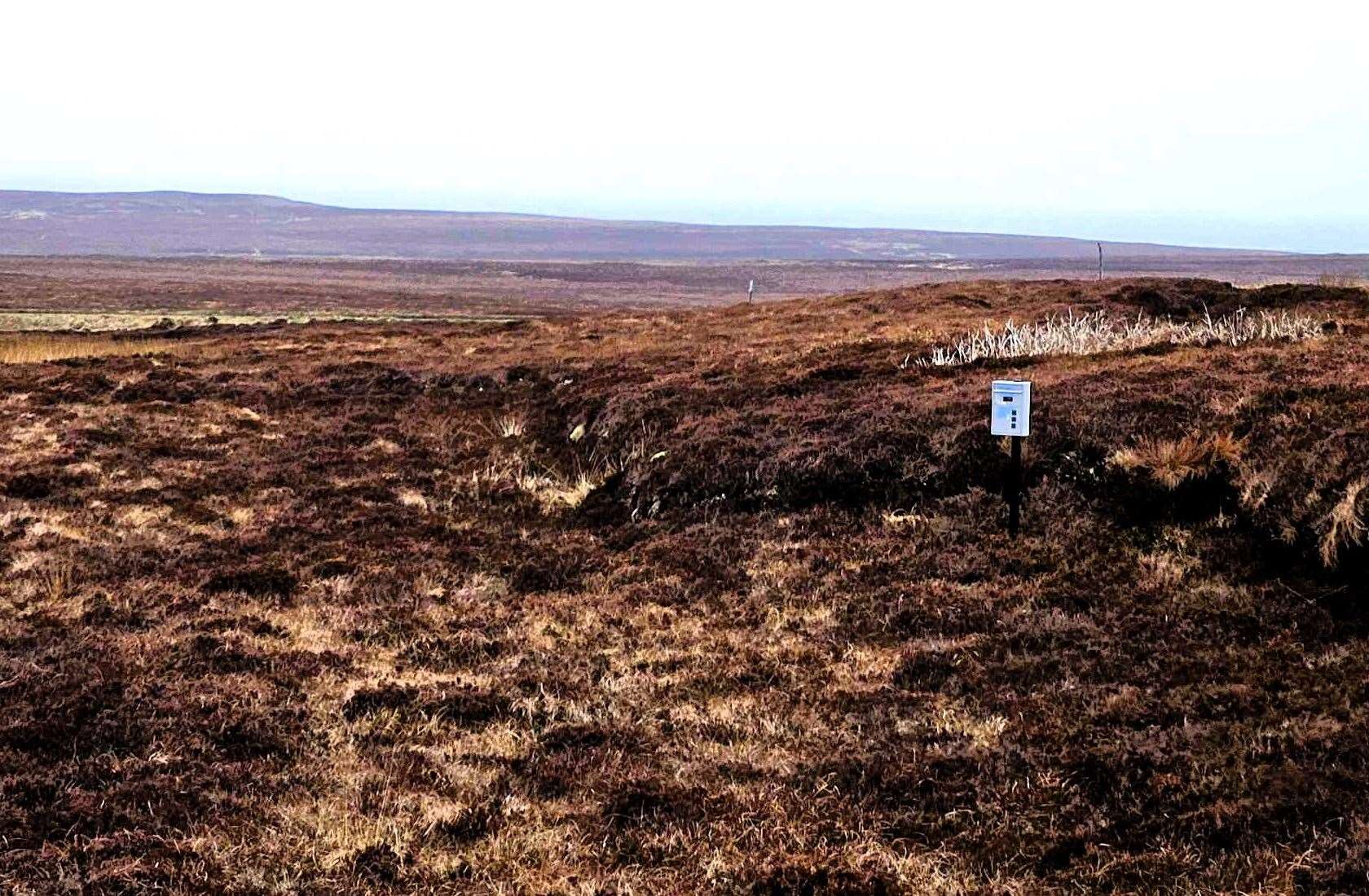 The postbox sits in deserted moorland on the north side of Warth Hill near John O'Groats. Picture: Chris Aitken
