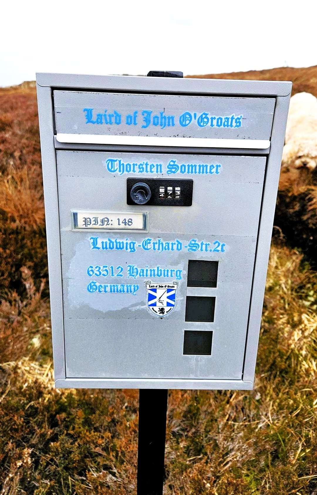 The postbox sits in moorland with no apparent house close by and has the title 'Laird of John O'Groats' on it. Picture: Chris Aitken